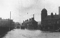 Cromford Road, along Station Road, with the Wesleyan Chapel on the right, and the Railway Tavern on the left.