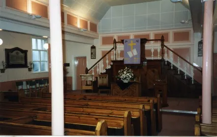 Interior views of the church before and after the alterations of 1993, which removed the organ and hid the first floor balcony.