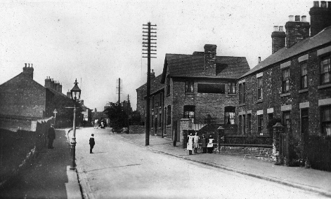 An early view of Cromford Road, showing the Durham Ox and, in the distance, the Aldercar Infants School.